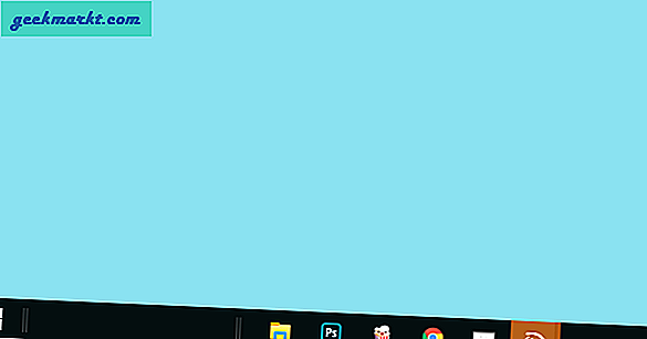 Hur centrerar jag aktivitetsfältets ikoner i Windows 10